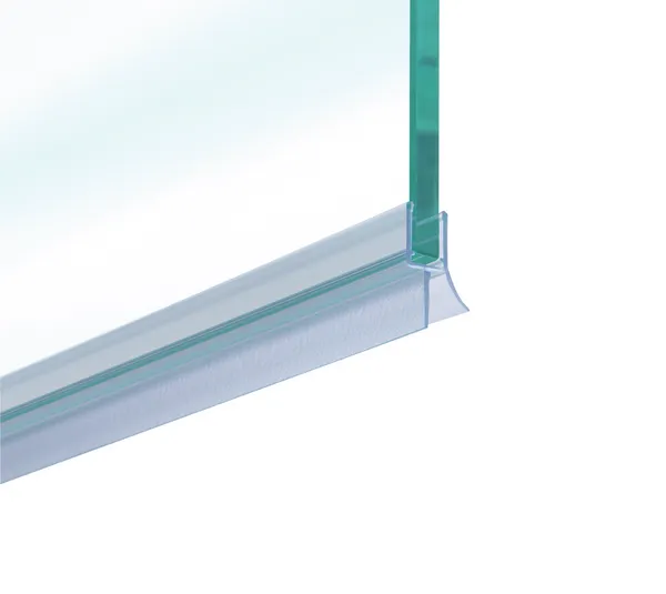 Shower door seal with lower sealing lip and water deflector